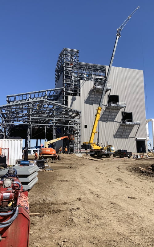 A building being fabricated and assembled